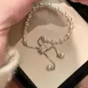 "Luz de Luna Blanca" Pulsera de Tirar de Perlas de Imitación Simple Francesa Moda de Gama Alta Pulsera Pequeña Destellante para Cintura de Hombre Versátil