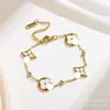 Europeu e Americano Mais Vendido Versátil 13mm Trevo de Quatro Folhas Flor Quatro Folhas Pulseira Madre-Pérola Galvanoplastia a Vácuo 18K Joia de Mão Fábrica Atacado
