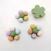Accesorios de resina de flor de cinco pétalos coloridos de dibujos animados, funda de teléfono con pegamento cremoso, joyería de flores multicolor, accesorios decorativos lindos