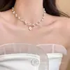 Collar de perlas de doble capa estilo retro francés para mujer, ligero, lujoso, de alta gama, con cadena para el cuello.
