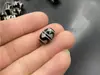 Acessórios para joias DIY 10*14mm contas pretas e brancas contas de ágata contas soltas dente de tigre pássaro Dapeng Lerzi