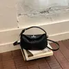 Bolso tejido tipo empanada súper popular transfronterizo para mujer, nuevo diseño de nicho 2026, bolso cruzado versátil de alta gama para el día a día