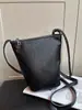 Bolso de Moda para Mujer 2026 Nuevo Verano Estilo Coreano Moderno Bolso de Hombro Cruzado para Teléfono con un Toque de Lujo, Bolso Cubo Sencillo y Elegante