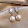 Pendientes de plata S925 con forma de aguja, estilo coreano, con nuevas flores y perlas, para mujer, estilo TikTok, diseño simple y elegante.