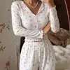 Ropa de casa transfronteriza europea y americana más vendida, pijama de dos piezas para mujer con estampado de corazón, manga larga y solapa, se puede usar para salir, con pantalón largo.