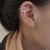 Clip para oreja de estrella cruzada de diamante flash sin agujero en la oreja INS clip para oreja de estrella gemela personalidad red de celebridad estrella hueca aretes falsos
