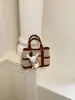 Nova bolsa de mão de moda transfronteiriça com blocos de cores retrô, bolsa de ombro e transversal de nicho de alta qualidade, bolsa de cesta feminina