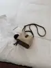 Bolso de mano nuevo de comercio exterior transfronterizo, bolso tipo cubo moderno y elegante para mujer, con un diseño único, adecuado para el trabajo diario, y se puede llevar como bolso de hombro o bolso cruzado