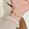 Pulsera de Cinco Calabazas de Alto Nivel Estilo Chino Cepillado Dorado para Mujer, Versátil de Lujo Ligero de Nicho, Pulsera de la Fortuna para el Día a Día