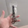 Venta al por mayor de llaveros populares para coche y llaveros de alta gama para motocicleta, perfectos como accesorios decorativos y pequeños regalos para exportación