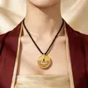 Nuevo collar de rosquilla chapado en oro cepillado estilo chino vintage, cadena larga trenzada para suéter versátil de nicho de lujo ligero, hebilla de paz