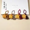 Chaveiro Pingente Urso Raivoso Fofo Cartoon Esculpido em Sândalo Dourado com Borlas Feitas à Mão, Adorável Ornamento para Bolsa
