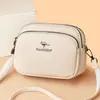 Bolso pequeño nuevo de cuero suave de moda para mujer, bolso versátil casual y moderno para hombro y cruzado, bolso multicapa para teléfono, bolso redondo pequeño