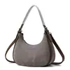 Bolso de nicho para mujer 2026 nuevo popular retro bandolera para debajo del brazo versión coreana bolso de mano de alto valor bolso tipo albóndiga