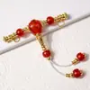 Ágata roja tres vías frotar línea dorada cuentas de barril viejo cuentas redondas Wen jugar accesorios DIY pulsera de mano con cuentas suministro al por mayor