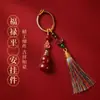 Nuevo Llavero de Cinabrio con Alto Contenido de Arena Dorada Púrpura, Colgante de Bolsa de Arena Roja Imperial, Accesorio del Año Zodiacal al por Mayor