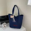 Bolsa de Lona de Grande Capacidade para Mulheres 2025 Nova Bolsa de Ombro Tote Estilo Coreano Ins Bolsa para Estudante Aula Trabalho