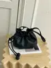Bolsa Saco com Cordão Estilo Simples Couro Macio Feminina 2026 Nova Versátil Textura de Lichia Ombro Único Transversal Bolsa da Sorte Bolsa Feminina