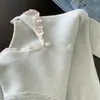 Suéter azul con cuello de muñeca ribeteado de encaje con capa base para mujer, nuevo top de punto de alta gama Otoño e Invierno 2025
