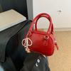Bolso pequeño de alta gama para mujer, bolso de mano de verano 2024, nuevo bolso bandolera tipo Boston con diseño de almohada y todo combinado.