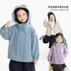 Ropa infantil Nuomi Wanzi, chaqueta cortavientos con capucha para niñas, estilo otoño, chaqueta resistente al viento de color liso, top versátil para exteriores