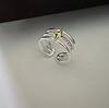 Versión coreana del anillo de diseño de nicho con contraste dorado y plateado de cuatro estrellas Anillo de moda simple de Corea del Sur venta al por mayor
