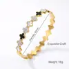 Venta al por mayor transfronteriza del fabricante Joyería de acero de titanio de alta gama con incrustaciones de diamantes de oro de 18 quilates para mujer, pulsera de acero de titanio de trébol de cuatro hojas que no se decolora