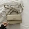 Diseño de nicho, bolso de mano de alta gama, nueva colección otoño 2026, retro moderno, minimalista, adecuado para ir al trabajo, bolso cuadrado pequeño, bolso de hombro, bolso cruzado