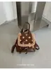 Mochila de lunares para mujer, mochila de viaje ligera, nueva mochila casual de nicho de moda de otoño 2026, mochila para estudiante universitario y para ir al trabajo