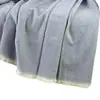 Manta de punto doble personalizada de fábrica OEM con pelo corto para sofá de oficina con aire acondicionado, manta de lana fina Clase A