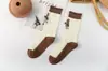 Calcetines exclusivos para mujer de Zhuji con puño, estilo primavera y otoño, calcetines de oso de estilo japonés de moda