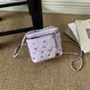 Bolso pequeño de cadena de rombos para mujer 2026 otoño nuevo estilo individual elegante temperamento ins moderno de un solo hombro bandolera bolso cuadrado pequeño