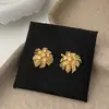 Pendientes Versátiles de Estilo Oscuro Retro de Moda Simple, Zirconita Café Dorado, Fuegos Artificiales, con Diseño Único de Nicho para Mujer