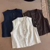 Chaleco cárdigan de punto liso retro japonés para mujer, otoño 2026, cuello redondo, botones a presión, con sentido del diseño y cordón para usar en capas en otoño