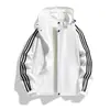 Chaqueta deportiva de tres rayas para primavera y otoño para hombres y mujeres, abrigo ligero casual con capucha, corte holgado, talla grande, ropa deportiva para correr