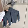2026 Ropa de invierno para niños Huzhou Zhili, camiseta de cuello alto estilo coreano para niñas, camiseta básica de manga larga para primavera y otoño 7625
