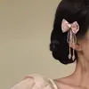 Estilo Nuevo Primavera y VeranoChica de Rostro LigeroPinza para el Cabello con Borla y Lazo Rosa con Diseño Dulce Pinza Lateral para el Cabello para Mujeres