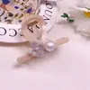 Presilha de Cabelo Meia Pérola Camélia Cruzada Clip Cruzado Acessório de Cabelo Pérola Estilo Fresco