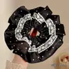 Goma para el pelo scrunchie floral vintage para mujer, accesorio para el pelo de estilo casual y de alta gama, nuevo modelo 2026 para moño