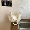 Bolsa de ombro simples e casual para mulheres, nova moda primavera 2026 bolsa bolinho, bolsa transversal estilosa de grande capacidade