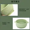 Tazón de alimentación para bebé de silicona de grado alimenticio con doble asa, diseño antiquemaduras y ventosa integrada para la autoalimentación infantil.