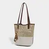 2026 Nuevo Modelo Bolso de Playa Tejido Bolso de Playa de Moda Bolso para el Trabajo Fresco Diseño Hueco Bolso de Hombro de Gran Capacidad