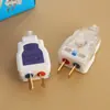 En stock al por mayor Xindatai enchufe transparente de dos pines autoblocante se puede fijar y girar enchufe industrial