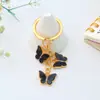 Chaveiro Borboleta com Franja Quente de Vendas Transfronteiriças com Diamante Pingente para Bolsa de Menina Presente Comemorativo de Feriado
