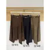Elegante saia de camurça assimétrica em estilo retrô para mulheres, nova coleção outono/inverno, cintura alta, saia evasê que afina o corpo com barra flare