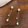 Pendientes de perla con colgante de gota de agua de aguja plateada, lujo ligero, alta gama, modernos, pendientes sencillos con un diseño único y encanto de nicho