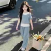 Conjunto de Verano para Niñas 2026 Nuevo Estilo Niños Muy Atractivo Falso Dos Piezas Manga Corta Estudiantes de Secundaria Conjunto Coreano Conjunto de Dos Piezas