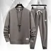 Conjunto de moletom esportivo casual masculino, corte solto, novo top moderno para primavera e outono, conjunto estiloso e simples