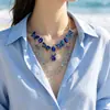 Collar floral vintage azul con cuentas de alta resistencia, cadena para la clavícula de mujer de estilo de noche elegante de lujo ligero versátil de nicho