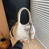 Bolsa Feminina de Axila 2026 Nova Tendência Primavera Versátil Nicho Jeans Uma Alça Bolsa de Trabalho para o Dia a Dia Bolsa Transversal